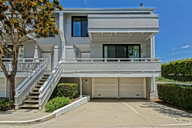 Building Photo - Remodeled, Bright & Airy End Unit Condo Overlooking Randall Preserve w/ Grand Entry Foyer, Open &...