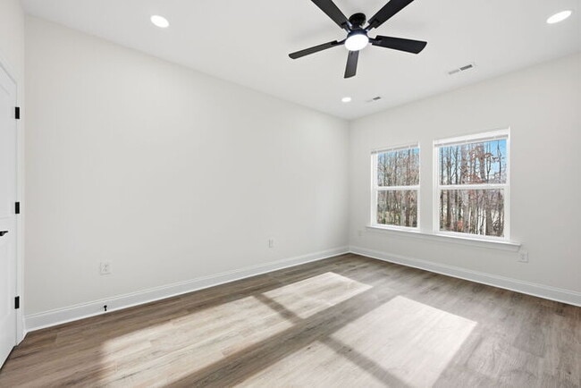 Building Photo - Stunning lakeside new construction: 4 bedroom and 3 bath home