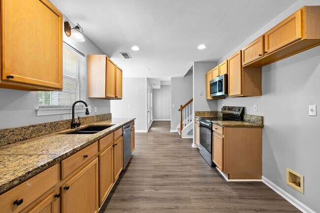 Building Photo - Updated 4BR Home in Northgate District with Huge Back Deck
