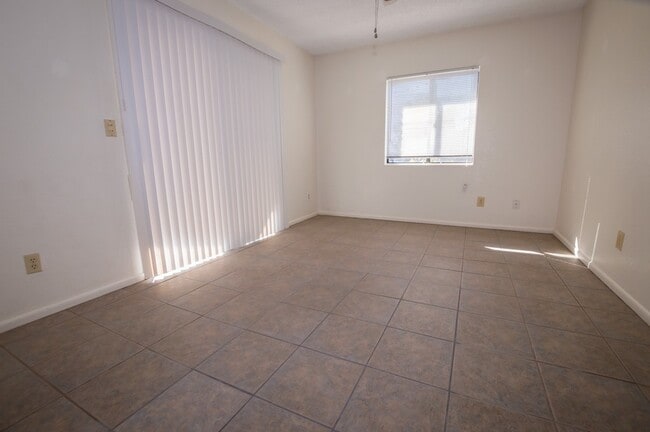 Building Photo - Welcome to this delightful 3-bedroom, 2-ba...
