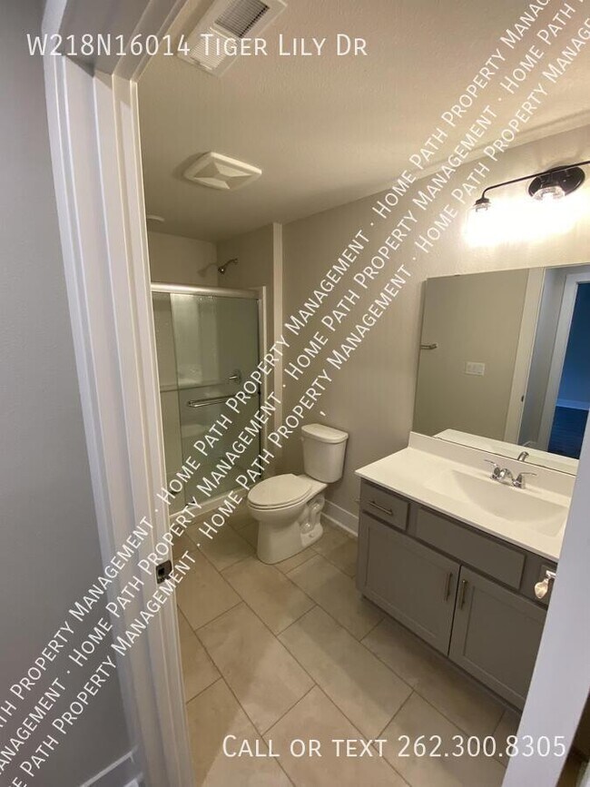 Building Photo - W218N16014 Tiger Lily Dr