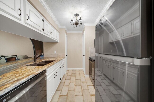 Building Photo - Welcome to your lakeside sanctuary in the ...
