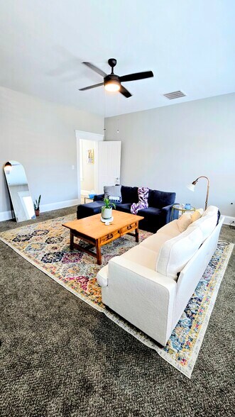 Large living room with natural light - 806 Main St