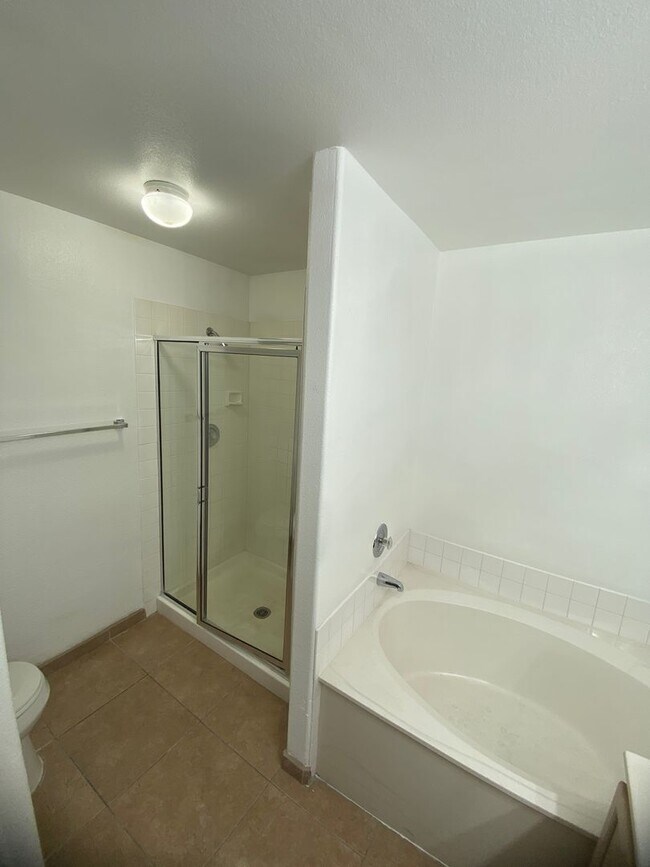 Building Photo - AMERICANA Property Mgmt - Downstairs 2 bed...
