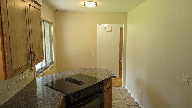 Building Photo - Spacious Three Bedroom with Large Backyard...