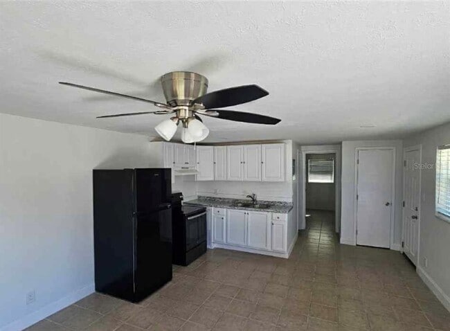 Building Photo - 917 E 121st Ave