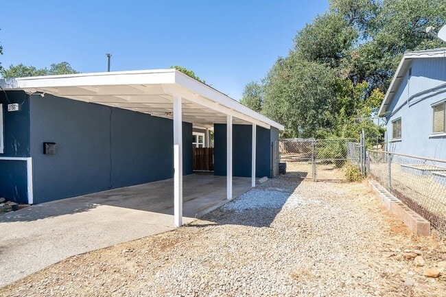 Building Photo - Home with Carport