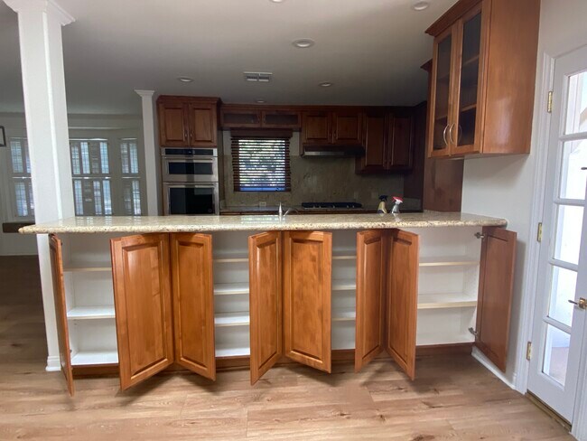 bkfst bar cabinets open - 4322 Elmer Ave