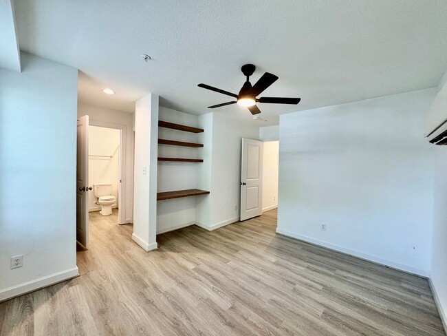 Building Photo - Practically New & Available May 1st! Luxur...