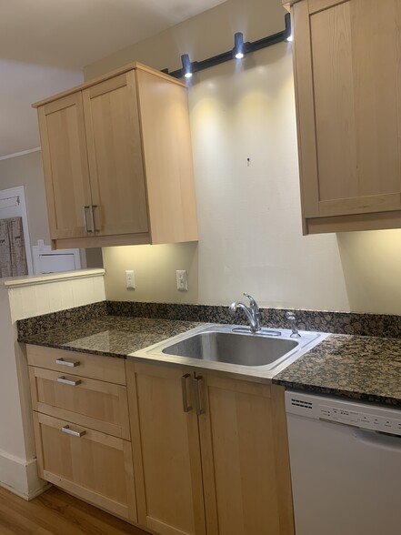 Large stainless steel sink with garbage disposal - 602 W 3rd St