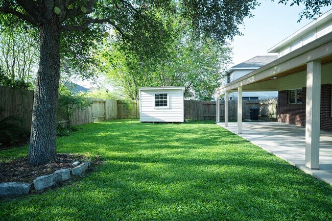 Building Photo - 8315 Cardamon Ln