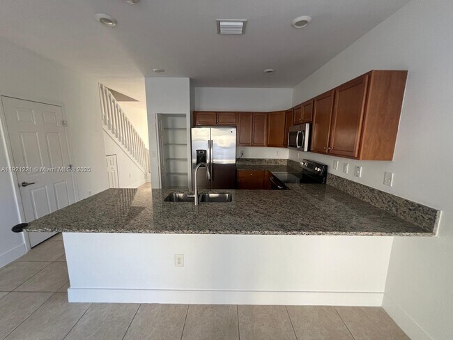 Building Photo - 9399 W 33rd Ln