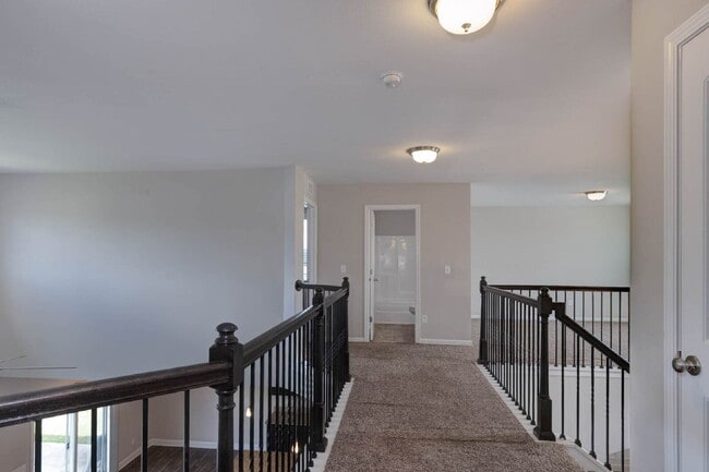 Building Photo - 4BR/3.5BA · 2,809 SF · Owner's Suite on Main · Fenced Yard · Midland, GA — $2,800/mo