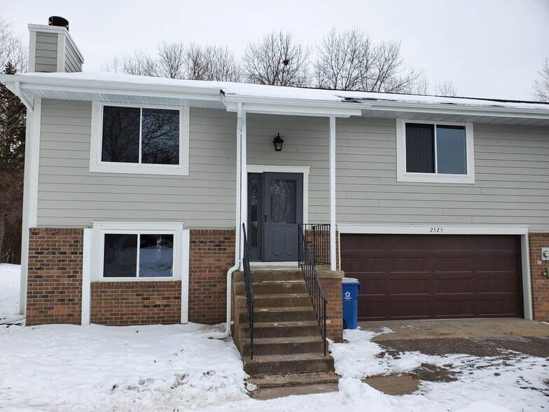 Home has all new siding, windows, gutters, and garage door. - 2525 Cedar Hills Drive