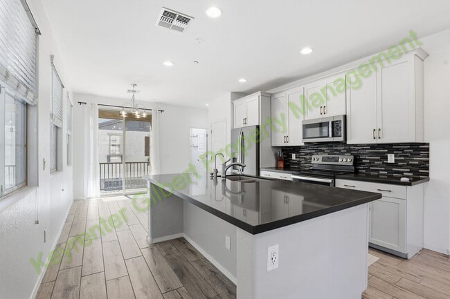 Building Photo - Modern Gilbert Lakeview Townhome in The La...