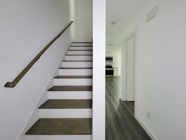 Building Photo - This newly constructed 3-bedroom, 2-bathroom unit offers modern living with 1,150 sq ft of space....