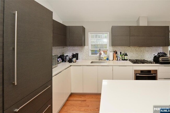 Building Photo - 38-55 van Riper Place Unit 1X