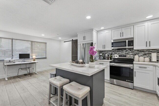 Building Photo - 830 NE 59th Ct