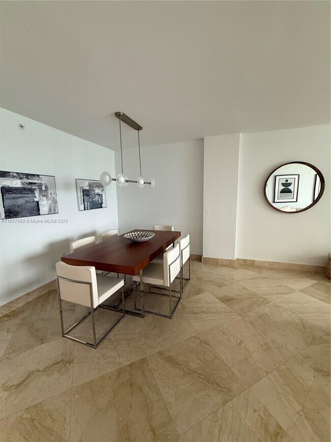 Building Photo - 10275 Collins Ave