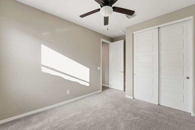 Building Photo - Stunning 4-Bed + Den Eastmark Home with Modern Upgrades Throughout