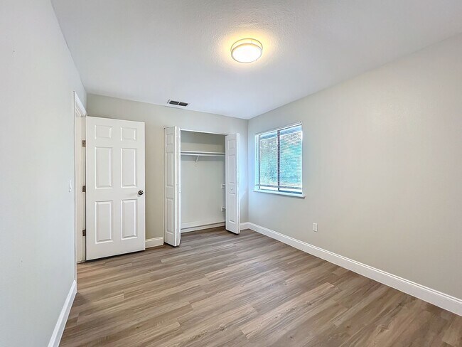 Building Photo - Stunning Waterfront Home located in the de...