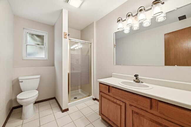 Building Photo - $2,845.95- 4-Bed /3-Bath Gem with Finished Basement and Fenced-in Yard in Colorado Springs!