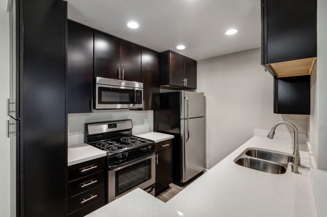 Two Bedroom Apartment Kitchen Interior with Appliances - Chelsea Court Apartments