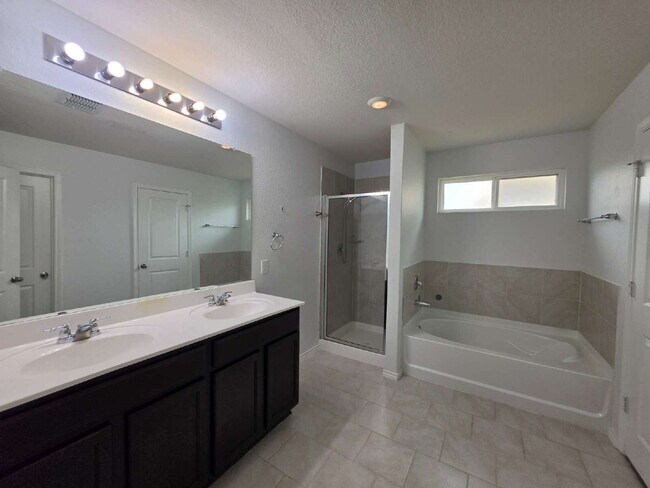 Building Photo - Ready Now – Freshly Painted & Move-In Ready!