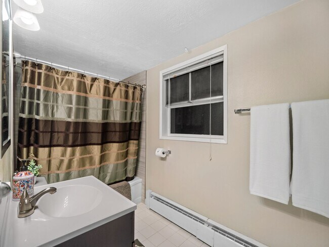 Building Photo - Spacious 2-Bedroom Home with Private Deck,...