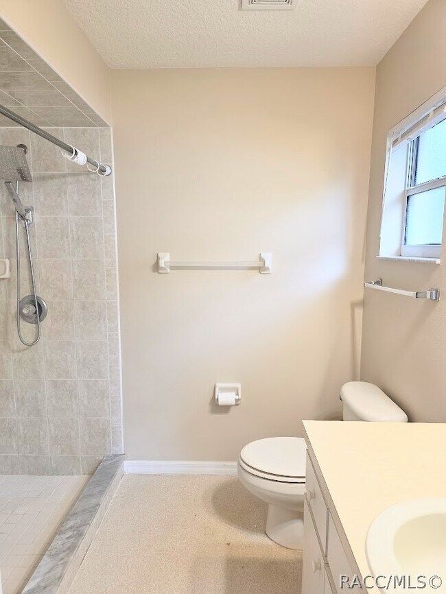 Building Photo - 9676 N Jourden Dr