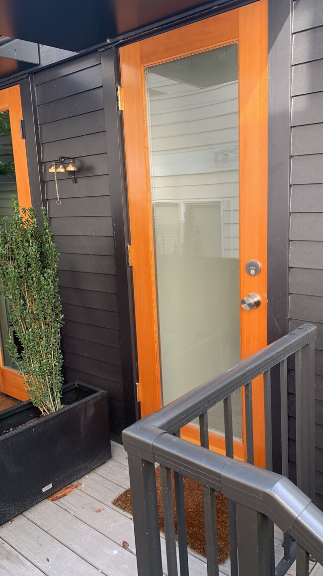 Back door onto small patio - 9603 15th Ave NE