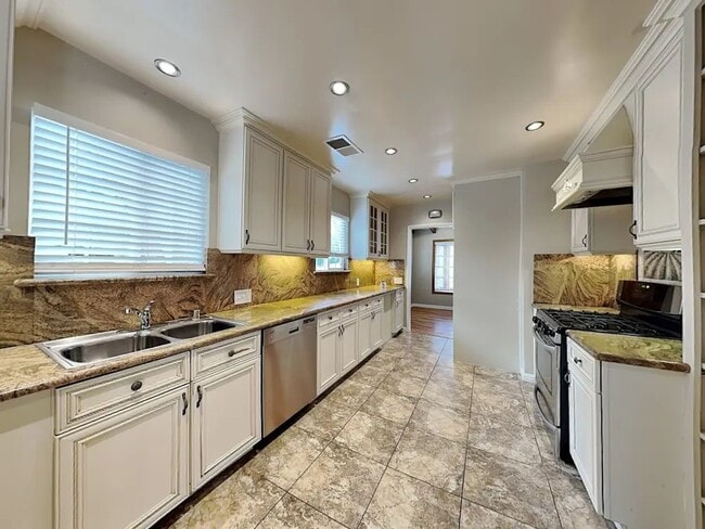 Building Photo - 14236 Enadia Way