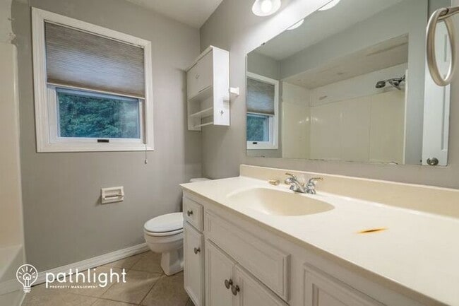 Building Photo - 5631 Whispering Pines Drive