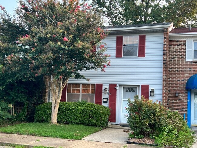 Primary Photo - Three-bedroom, two-and-a-half bathrooms in...