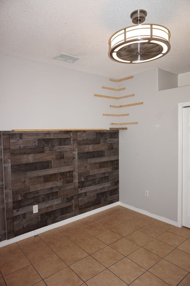 Building Photo - Designer 3/2 with 2 Car Garage in Desirabl...