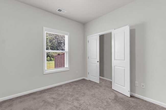 Building Photo - Spacious 4-Bedroom Home with Modern Upgrad...