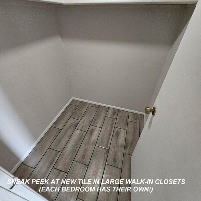 Sneak peek of beautiful new tile flooring in walk-in closets - 850 S River Dr