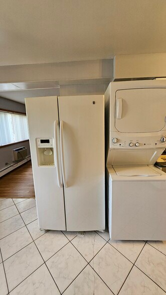 Refrigerator and laundry/dryer. - 746 Dempster St