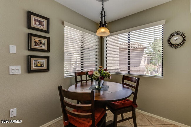 Building Photo - 9455 E Raintree Dr