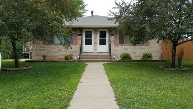 Building Photo - 4 Bedroom Duplex