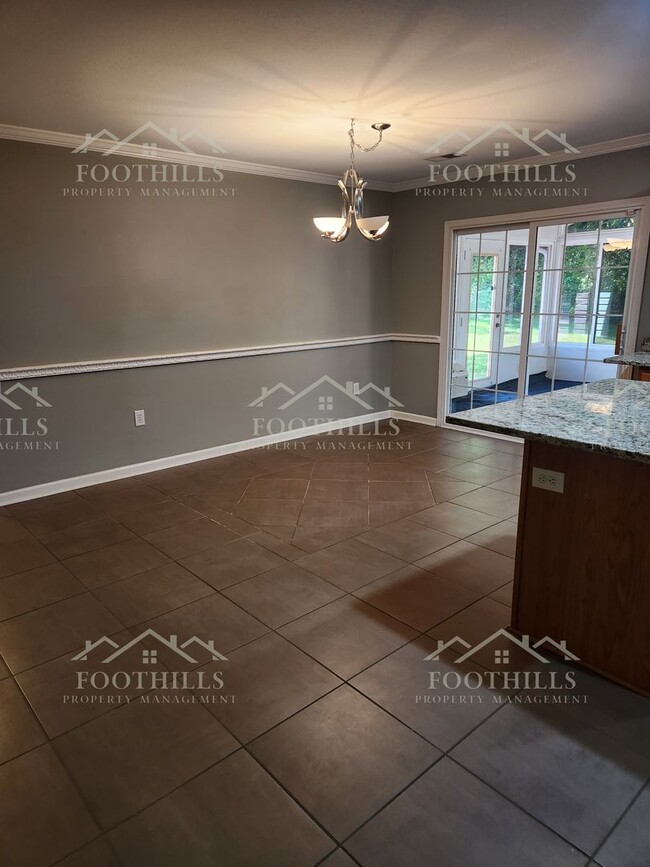 Building Photo - Beautiful 3-Bedroom Brick Home with Sunroo...