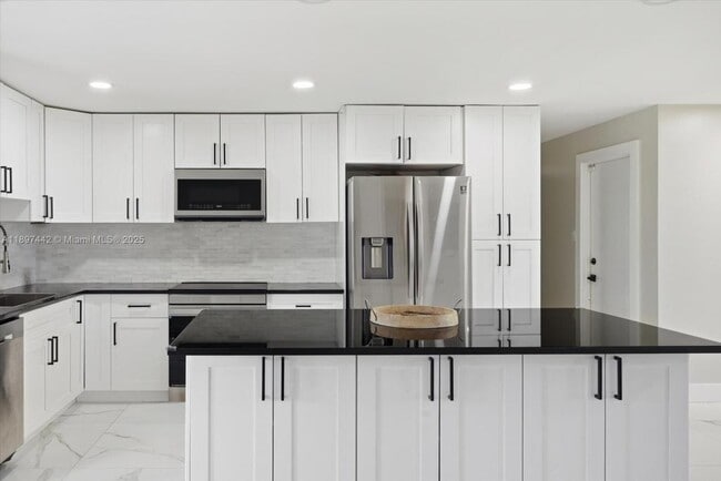 Building Photo - 6948 NW 8th Ct