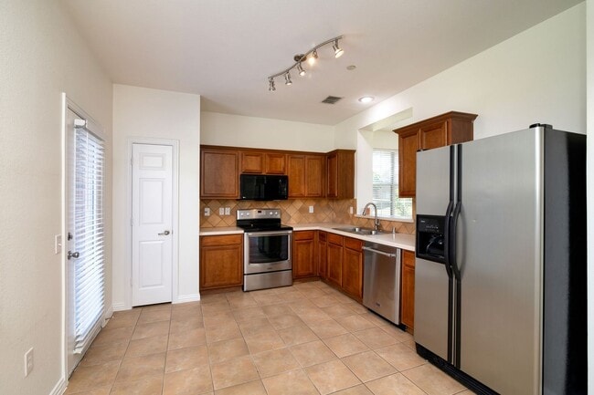 Building Photo - Townhome in Parker Estates!! READY for move in early June