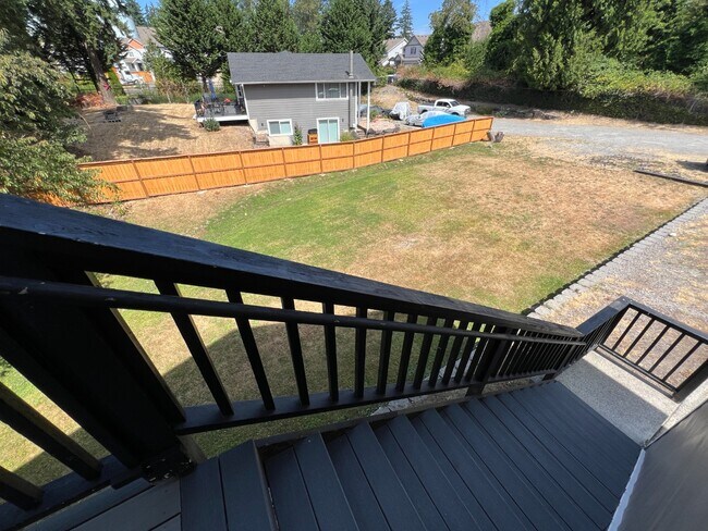 Building Photo - Elevated 3-Bedroom Home with Secure Garage & Cozy Living Space