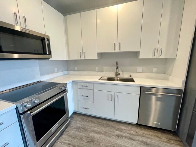Building Photo - AVAILABLE MID-JUNE! BRAND NEW 1-Bedroom in...