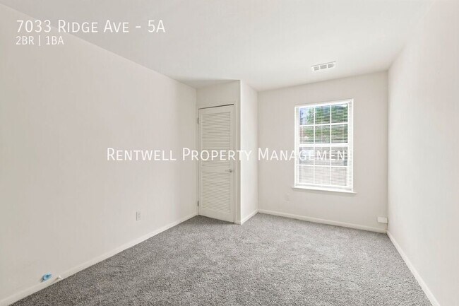 Building Photo - 7033 Ridge Ave