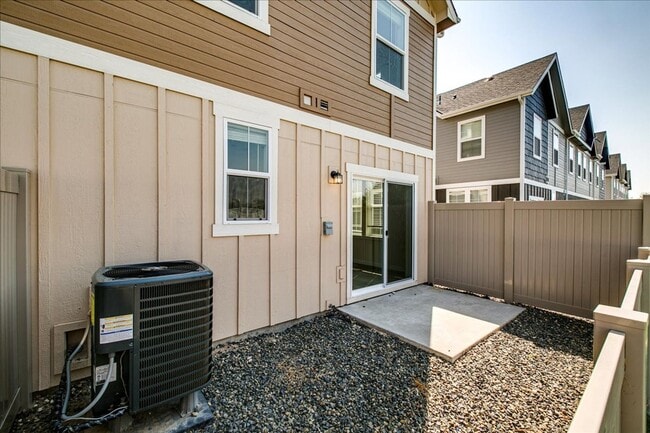 Building Photo - Two Story Townhome Located Off Of Amity & Five Mile!