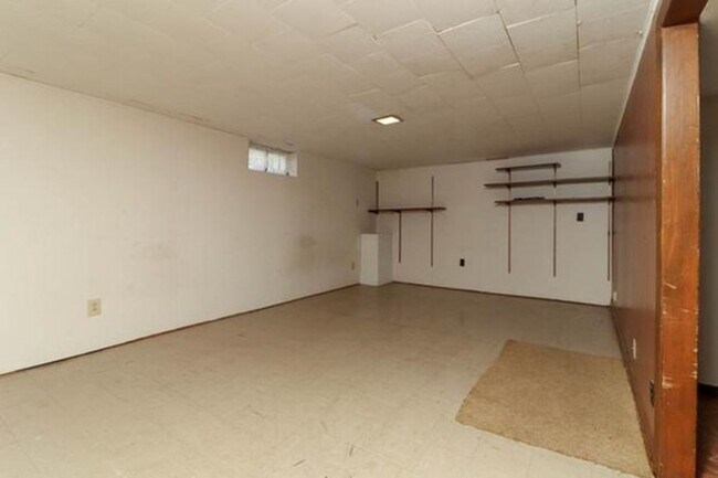 Building Photo - Spacious 3-Bedroom Home with Oversized Gar...