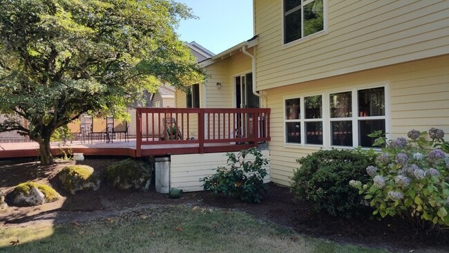 Building Photo - Private Summer Ridge Retreat with Vaulted Ceilings & Fenced Backyard
