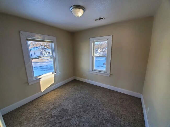 Building Photo - Rental home with deck, garage, and great backyard!